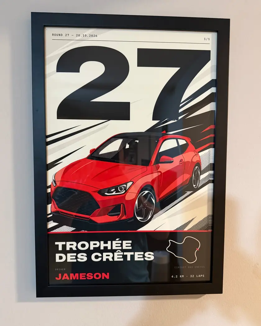Jameson's framed 12 by 18 race poster of his red Veloster, number 27, hanging on his wall