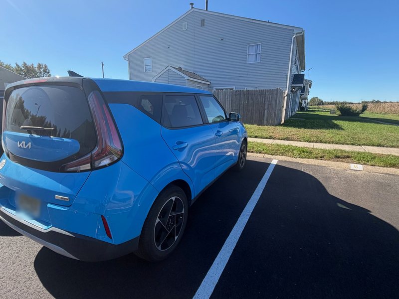 Phone photo of the crossover from the rear, plate blurred